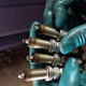 Illustration for article titled Strut Tops and Spark Plugs
